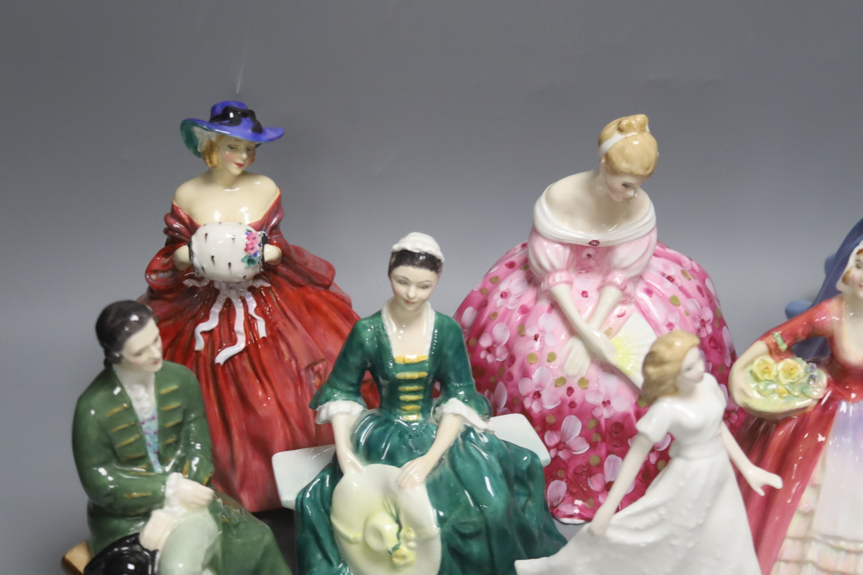 Eight various Royal Doulton figurines, tallest 22cm